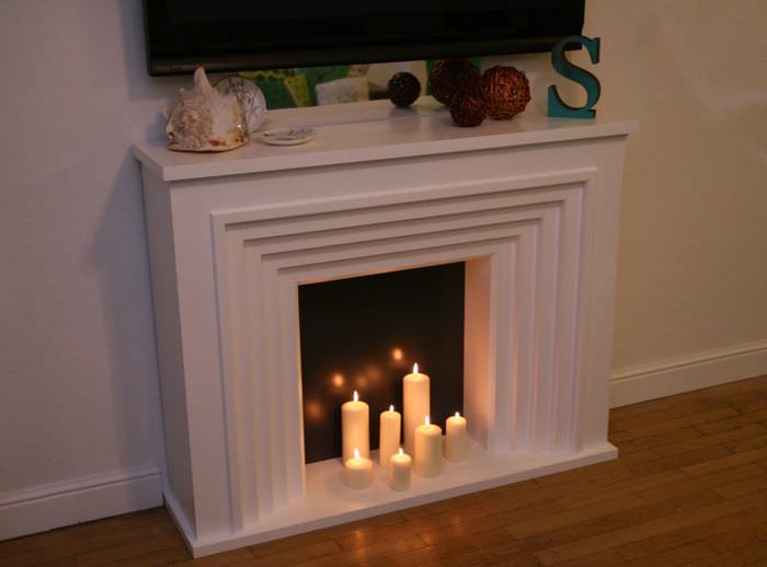 Декоративный камин с парафиновыми свечами своими руками